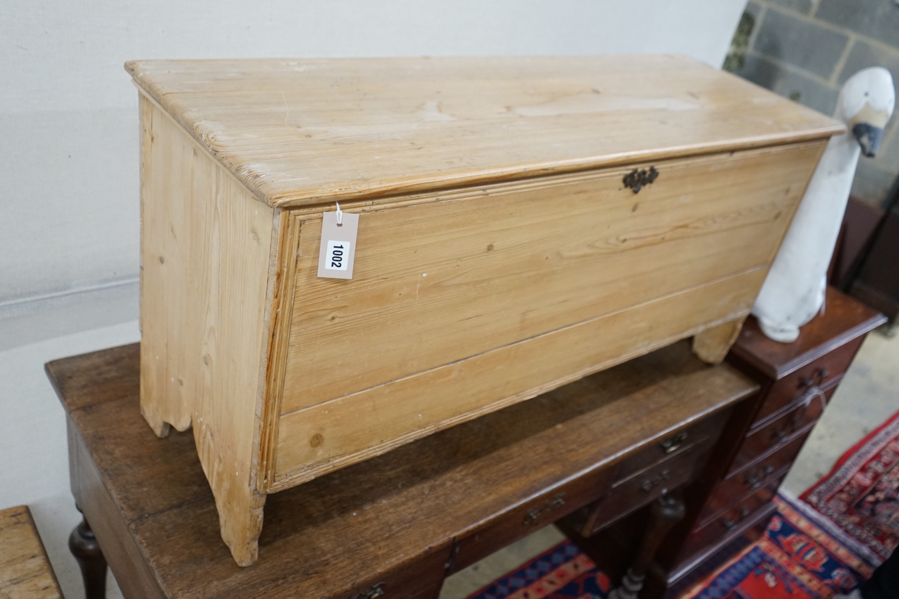 An early 19th century pine coffer, length 113cm, depth 38cm, height 55cm